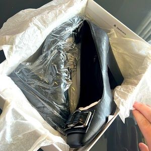 Calvin Klein 9 1/2M Black with buckle high heel. NEW